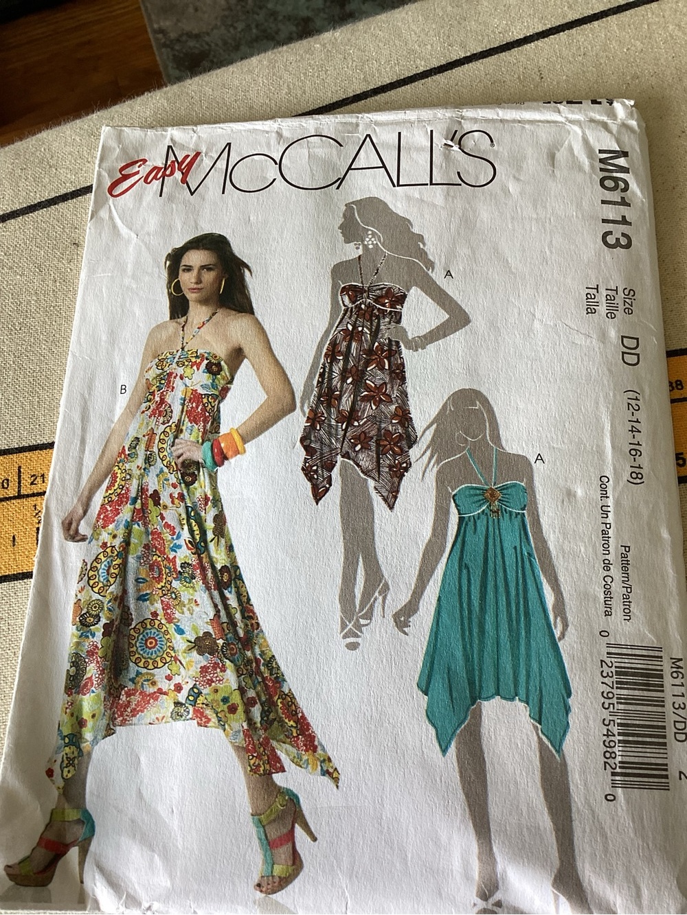 McCall's Women's Strapless, halter, shaped stitched Hem Dress